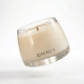 Minimalist soy candle in clear glass container on white background – Aphorecy